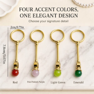 Six gold cigarette holder rings with shimmering colored balls showing dimensions of 7.8cm length and 2cm ring diameter