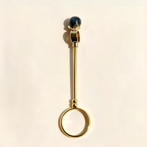 Six gold cigarette holder rings with shimmering colored balls showing dimensions of 7.8cm length and 2cm ring diameter