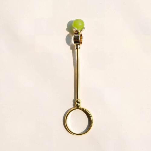 Six gold cigarette holder rings with shimmering colored balls showing dimensions of 7.8cm length and 2cm ring diameter