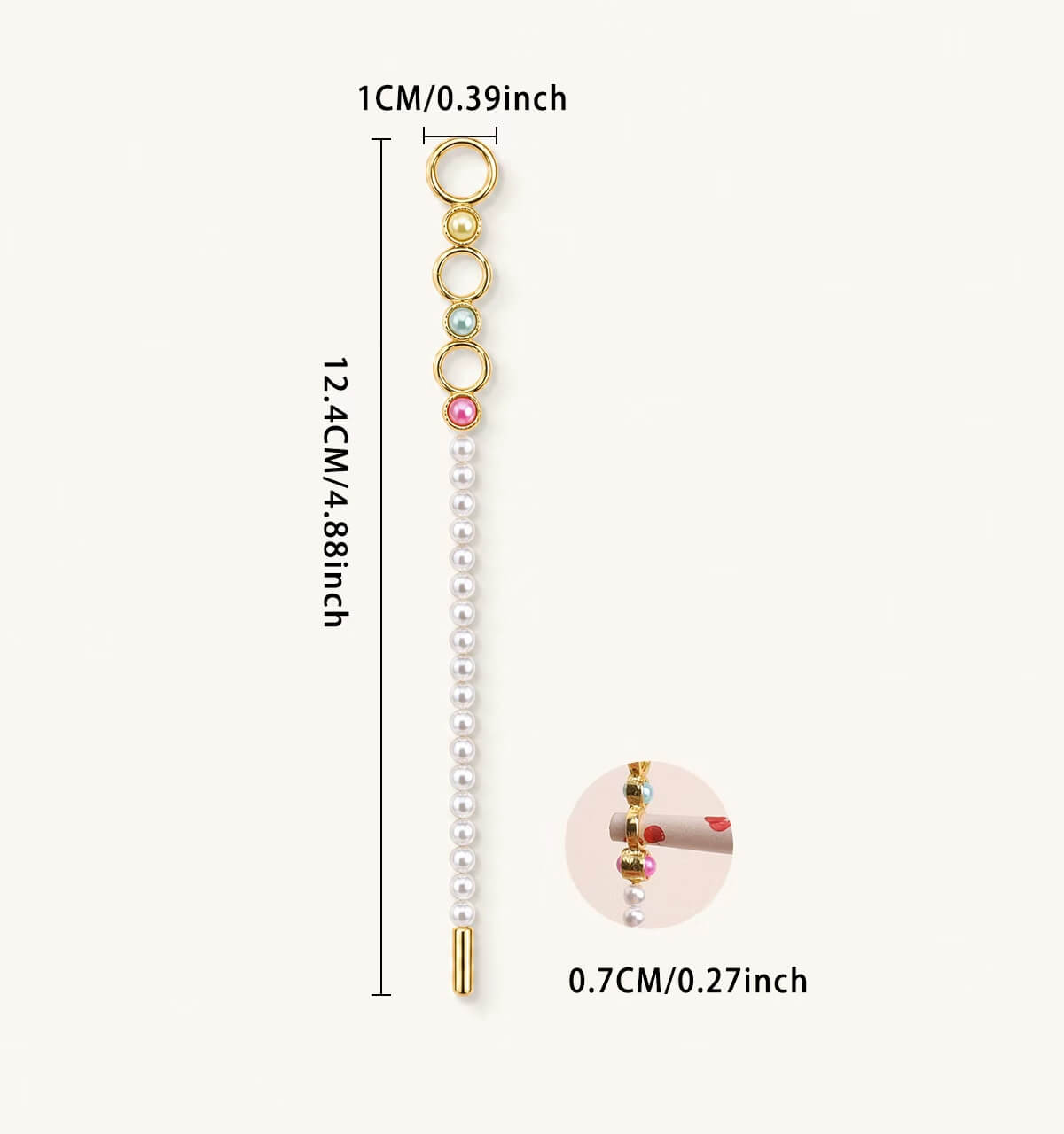 Assorted wholesale beaded joint holder sticks featuring gold rings, colorful crystal beads, and pearls on a ceramic plate