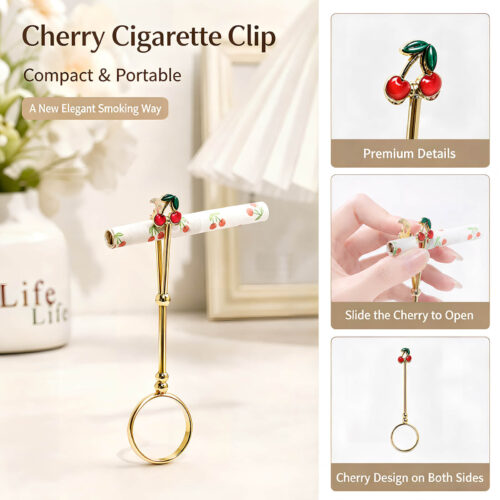Gold joint holder ring topped with cute red enamel cherries held on a finger